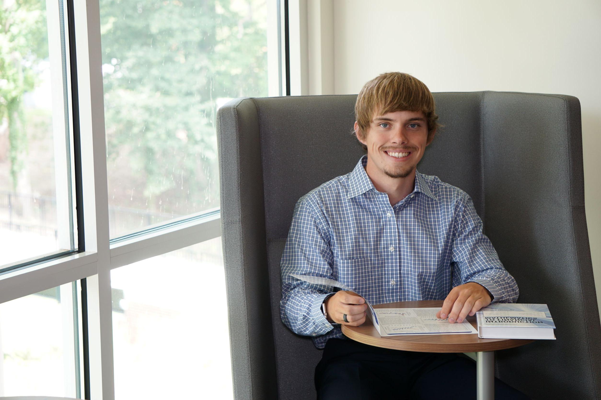 Student studying with laptop