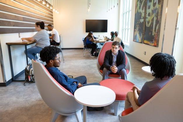 students sitting in innovation lounge