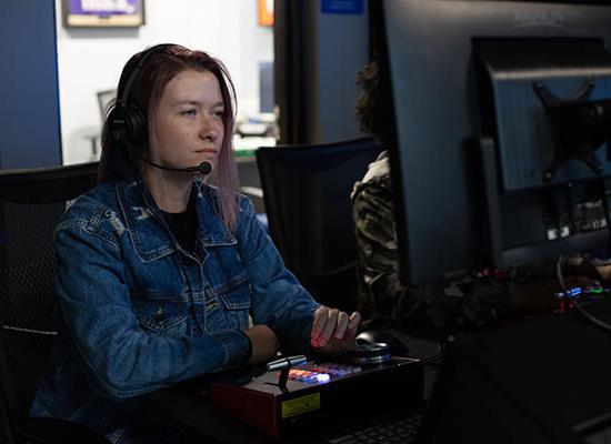 Student sitting in a control room